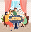 Mother, father and daughter play together, indoors home activity, cold snowy winter outside window Royalty Free Stock Photo