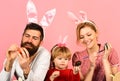 Mother, father and daughter preparing for Easter Royalty Free Stock Photo