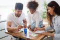 Mother and father drawing together with their child Royalty Free Stock Photo