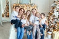 Mother father and five children near Christmas tree at home Royalty Free Stock Photo