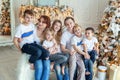 Mother father and five children near Christmas tree at home Royalty Free Stock Photo