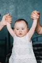 Mother and father hands holding little toddler girl Royalty Free Stock Photo