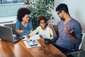 Mother and father helping daughter to do homework learning to calculate Royalty Free Stock Photo