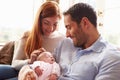 Mother And Father At Home With Newborn Baby Royalty Free Stock Photo