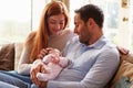 Mother And Father At Home With Newborn Baby Royalty Free Stock Photo