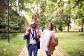 Mother and father playing with daughter