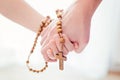 Mother and father praying together Royalty Free Stock Photo