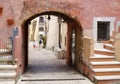 Mother and father with their son walking together in italian picturesque village. San felice Circeo, Lazio, Italy