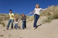 Mother, Father and Two Boys Family Fun At Beach Royalty Free Stock Photo