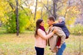 Mother and Father With Young Son Autumn Park Royalty Free Stock Photo