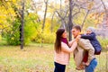 Mother and Father With Young Son Autumn Park Royalty Free Stock Photo