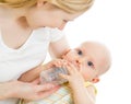 Mother feeding her baby boy infant from bottle Royalty Free Stock Photo