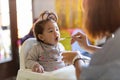 Mother feeding her baby Royalty Free Stock Photo