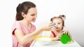 Mother feeding her little baby with healthy food. healthy eating concept Royalty Free Stock Photo