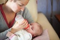 Mother feeding infant baby