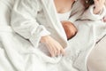 Mother feeding nursing newborn baby Royalty Free Stock Photo