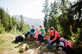 Mother with four kids resting in mountains. Family travel and hiking with childrens Royalty Free Stock Photo