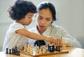 Mother, girl and chess board play for learning growth, development challenge or bonding time. Child, woman or game fun