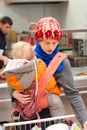 Mother with girl shopping in supermarket