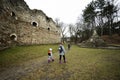 Mother and girls visit ancient medieval fortress Terebovlia castle, Ukraine