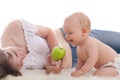 Mother give green apple to her son Royalty Free Stock Photo