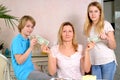 Mother giving her children pocket money Royalty Free Stock Photo