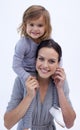Mother giving her daughter piggyback ride Royalty Free Stock Photo
