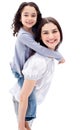 Mother giving her daughter piggyback ride Royalty Free Stock Photo