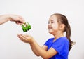 Mother giving the purse to a little girl Royalty Free Stock Photo