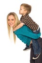 Mother Giving Son Piggyback Ride Royalty Free Stock Photo