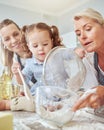 Mother, grandma and girl baking in family home, to make snack, biscuit or pie while have fun. Happy mom with proud Royalty Free Stock Photo