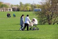 Mother, grandmother and baby on a walk.