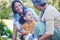 A mother, grandmother and daughter gardening together outdoor for growth or sustainability during spring. Plants, kids