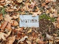 Mother on granite or marble grave stone in cemetery