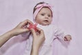 Mother hand giving plastic soother Royalty Free Stock Photo