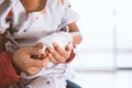 Mother hand holding sick daughter hand who have IV solution Royalty Free Stock Photo