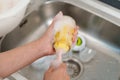 mother hand washing baby plastic milk bottle Royalty Free Stock Photo