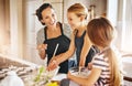 Mother, happy family or children baking in kitchen with siblings learning cookies recipe or mixing pastry. Laughing Royalty Free Stock Photo