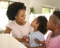 Mother Helping Children Brushing Teeth In Bathroom At Home Before Bed Royalty Free Stock Photo