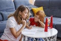 Mother helping daughter with homework Royalty Free Stock Photo