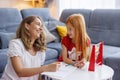 Mother helping daughter with math homework Royalty Free Stock Photo