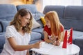 Mother helping daughter study math Royalty Free Stock Photo