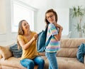 child mother family education school girl home daughter backpack help parent getting ready elementary teen morning hug Royalty Free Stock Photo