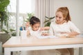 Mother helping her little child with homework Royalty Free Stock Photo