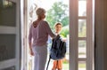 Mother helping son get ready for school Royalty Free Stock Photo