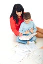 Mother helping son with homework Royalty Free Stock Photo
