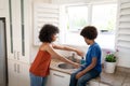 Mother helping son to wash his hands at home Royalty Free Stock Photo