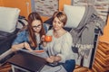 Mother helps her teenage daughter with homework Royalty Free Stock Photo
