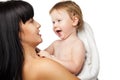 Mother with her baby after bathing in white towel Royalty Free Stock Photo