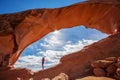 Mother with her baby son stay below Skyline arch in Arches National Park in Utah, USA Royalty Free Stock Photo